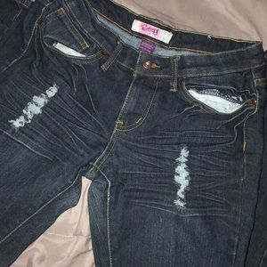 Dark blue jeans with rips